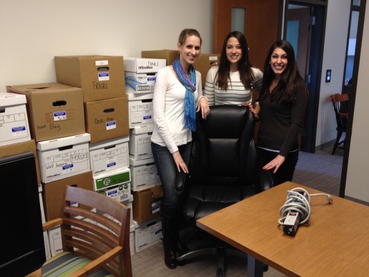 Jill, Melissa, and Kim unpack the Weston Career Center offices.