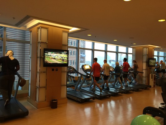 Shanghai Marriott 6th floor fitness center has numerous cardiovascular machines, weights, and fitness balls. 