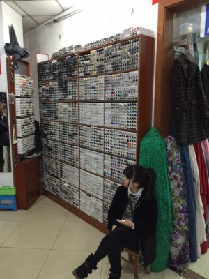 A wall of buttons at the South Bund Soft Spinning Material Market. 