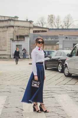 Waiting outside the Gucci show to see fabulous outfits - like this blogger’s pretty ensemble - photo by Paulina Gallagher