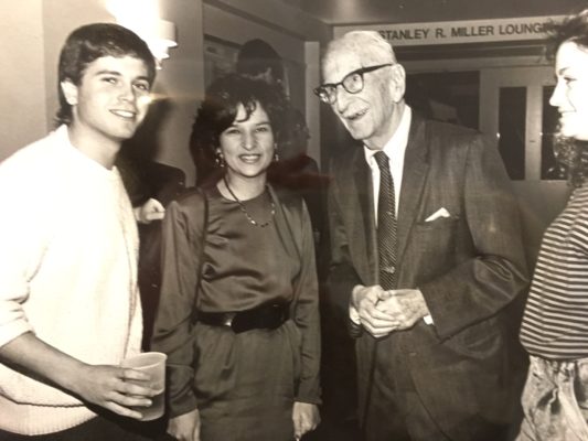 John Simon with business school students in newly opened Simon Hall, 1987.