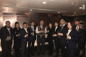 Students with Albert Ip at a happy hour event during their January career trek visit to Hong Kong.