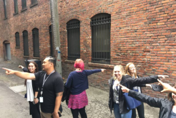 Team on an Amazon corporate scavenger hunt with Let's Roam,