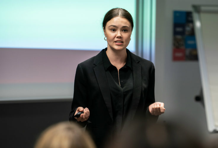 Andrea Adams, MBA '21, doing a presentation for class while in Barcelona for the global immersion.